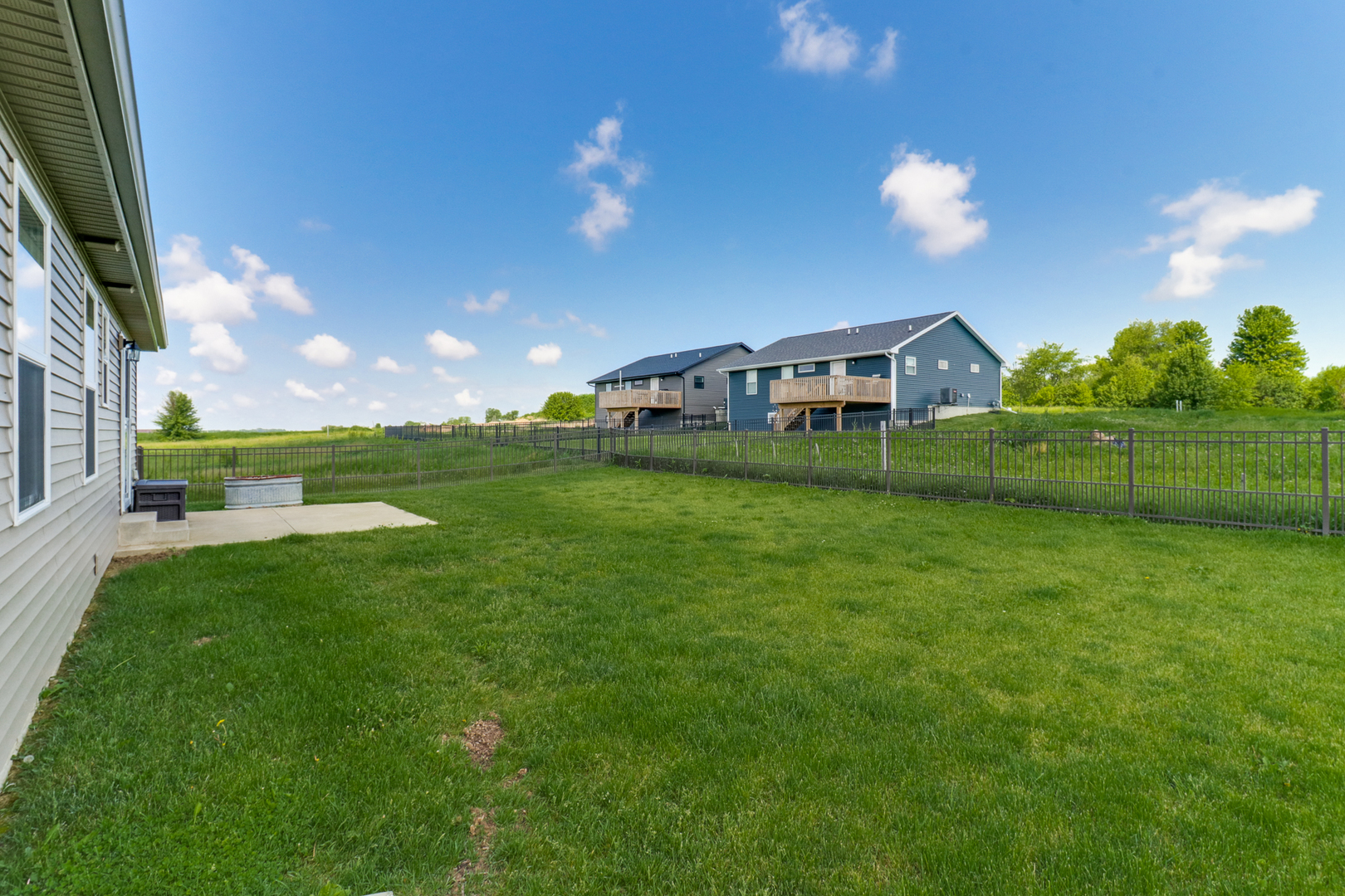 51 Winding Way Bloomington, IL 61705 - Photo 27 of 39 a view of a house with a big yard