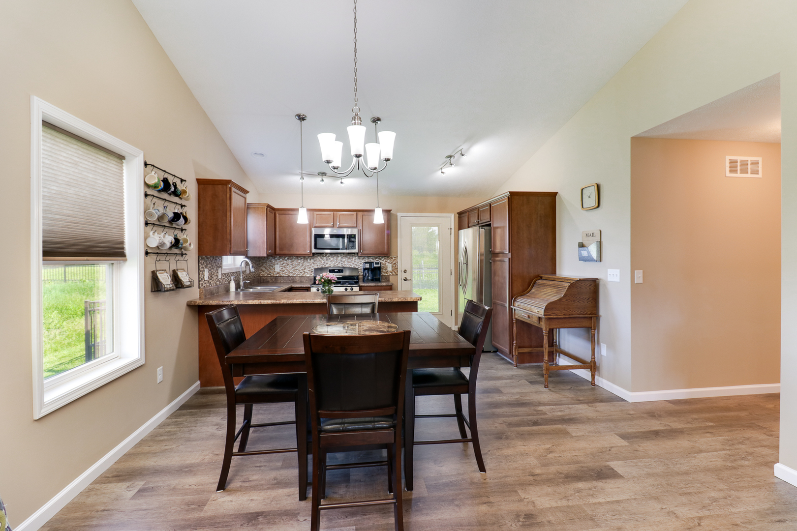 51 Winding Way Bloomington, IL 61705 - Photo 5 of 39 a view of a dining room with furniture window and wooden floor