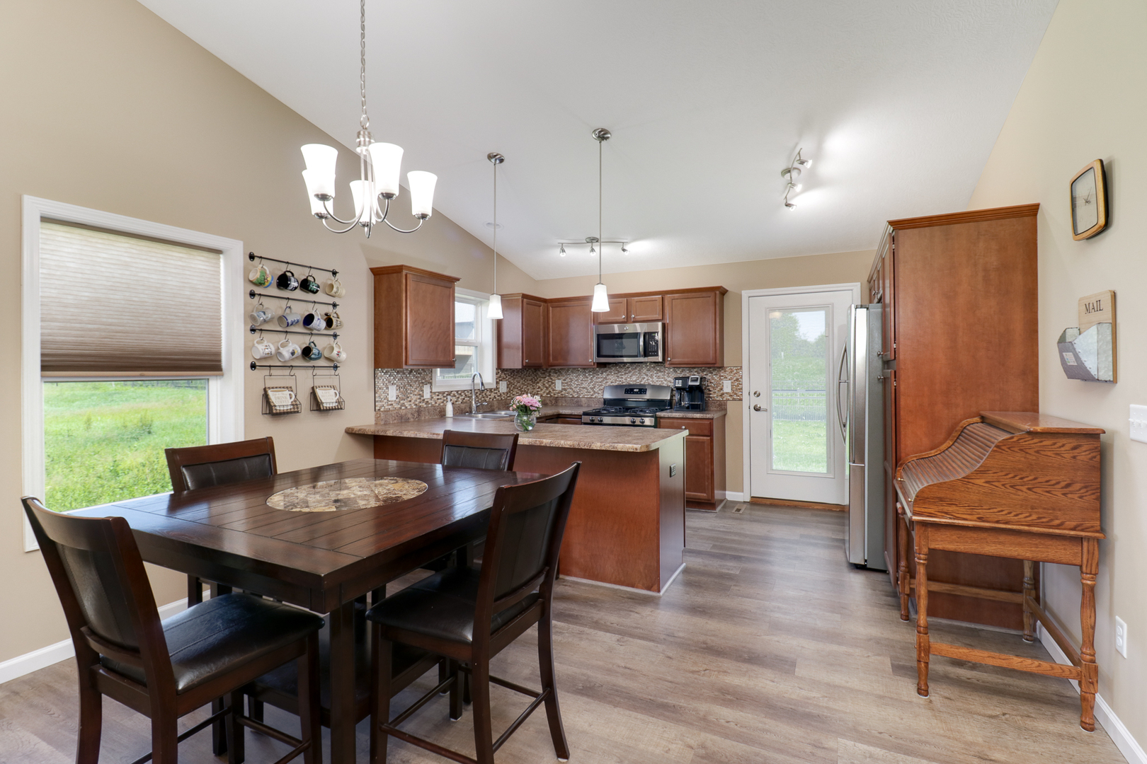 51 Winding Way Bloomington, IL 61705 - Photo 6 of 39 a view of a dining room with furniture window and wooden floor