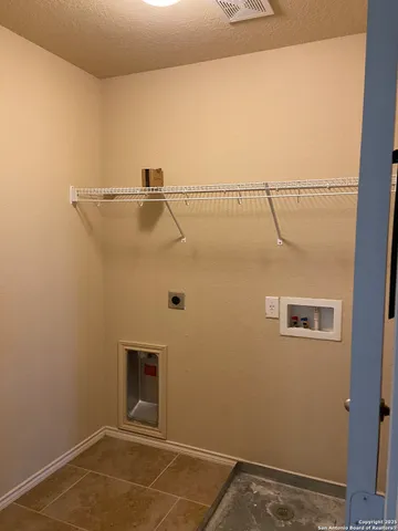 a view of a room with racks on the wall