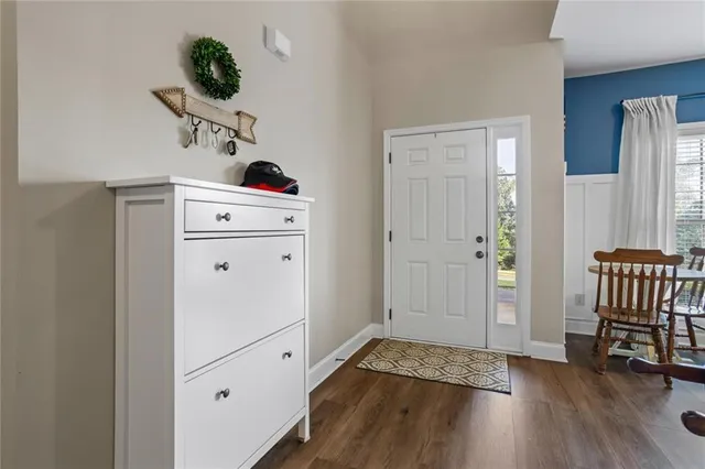 a view of a hardwood floor and wardrobe