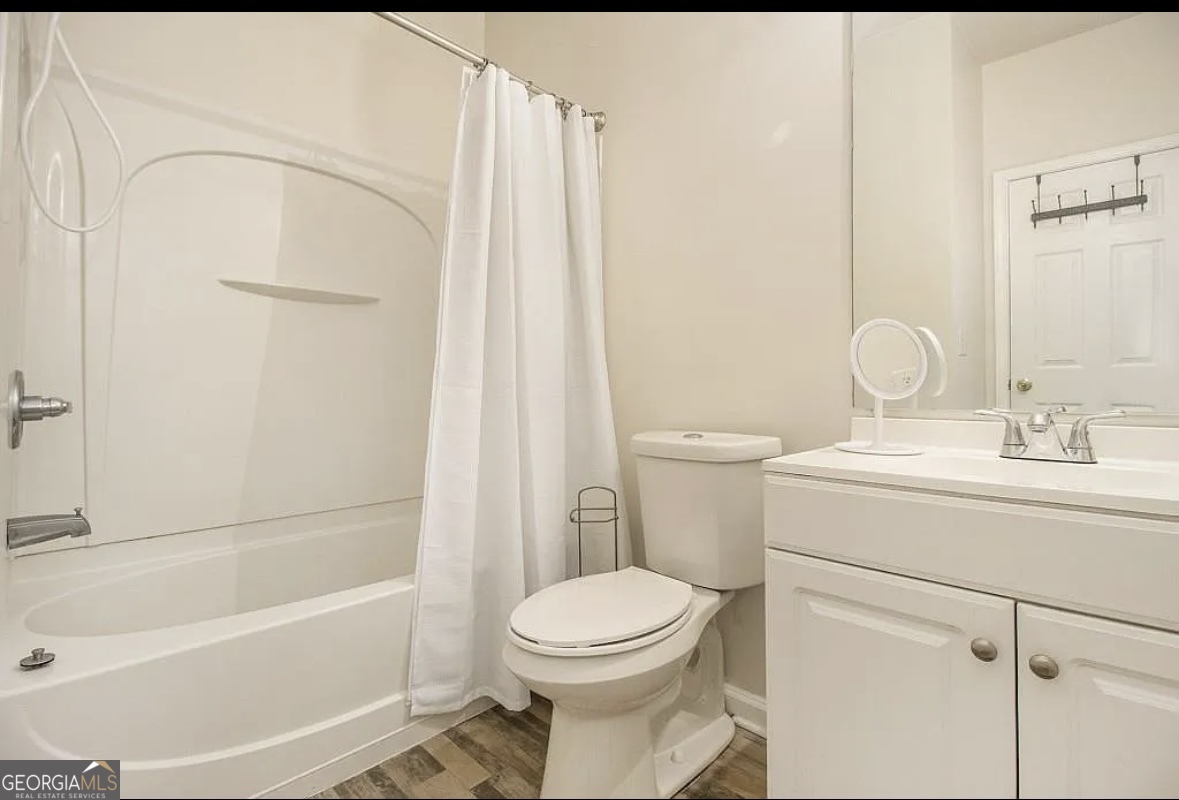 3669 Utoy Drive Southwest Atlanta, GA 30331 - Photo 14 of 22 a bathroom with a sink toilet and shower