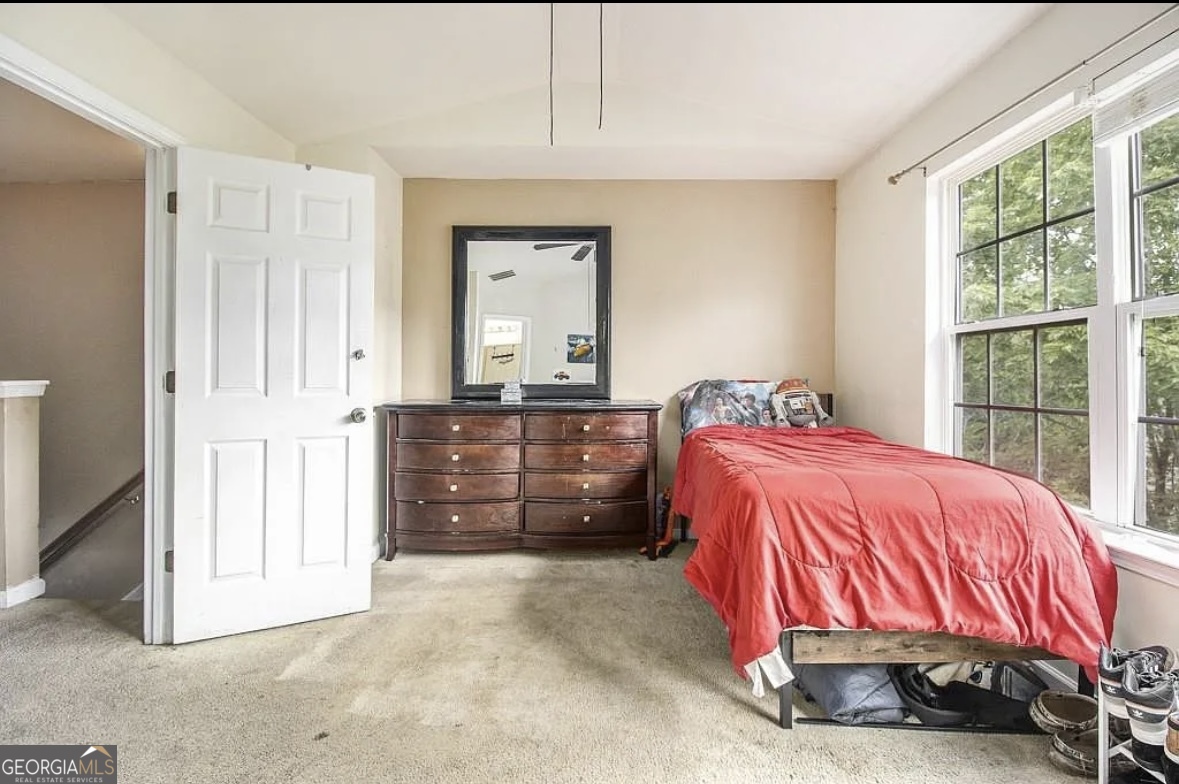 3669 Utoy Drive Southwest Atlanta, GA 30331 - Photo 15 of 22 a bedroom with a bed and a dresser