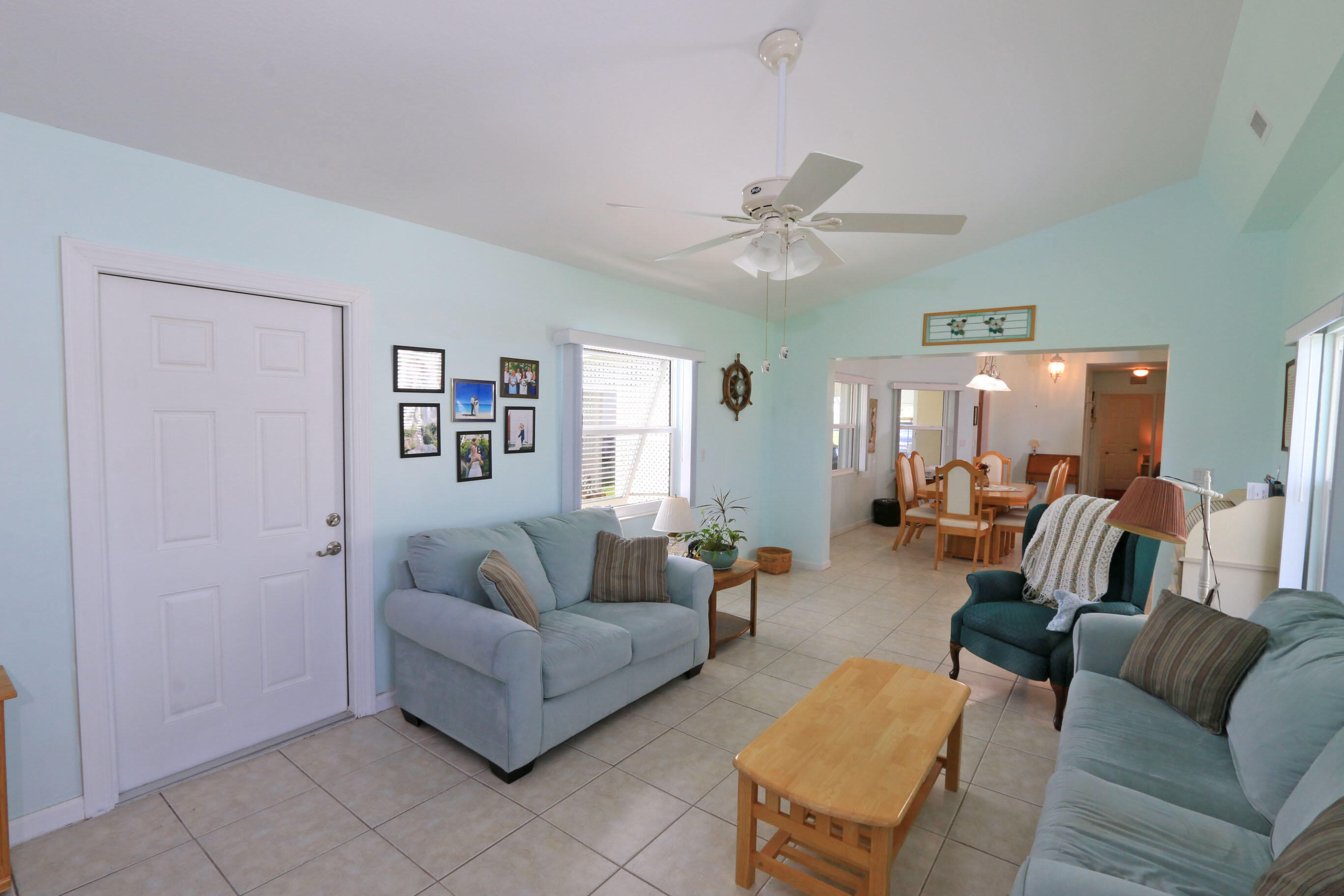 4350 Southwest 9th Way Okeechobee, FL 34974 - Photo 14 of 52 a living room with furniture and wooden floor