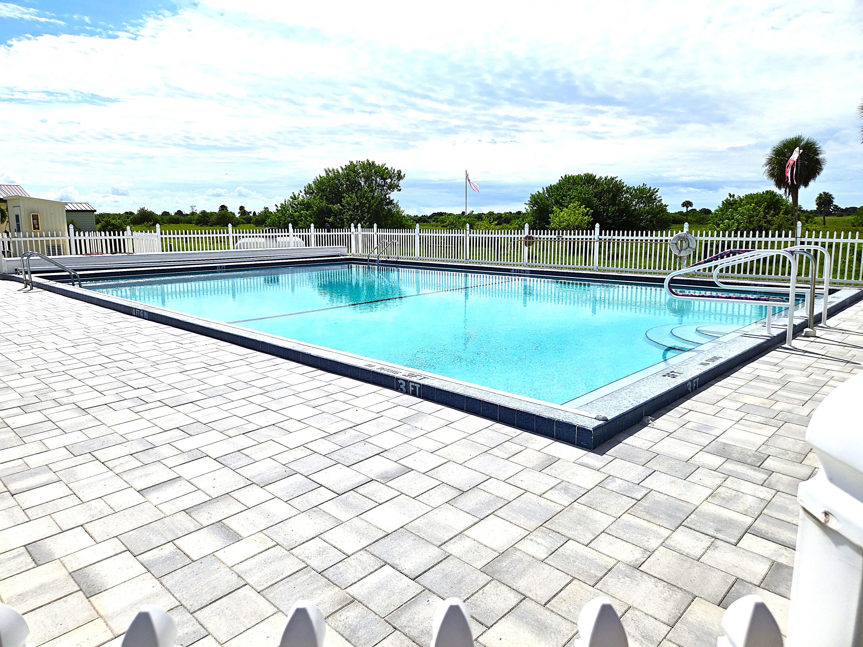 4350 Southwest 9th Way Okeechobee, FL 34974 - Photo 38 of 52 a view of swimming pool with a back yard