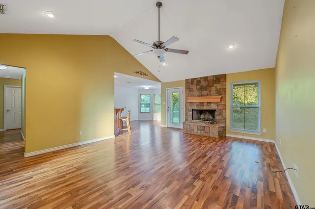 a view of livingroom with hardwood floor and a ceiling fan