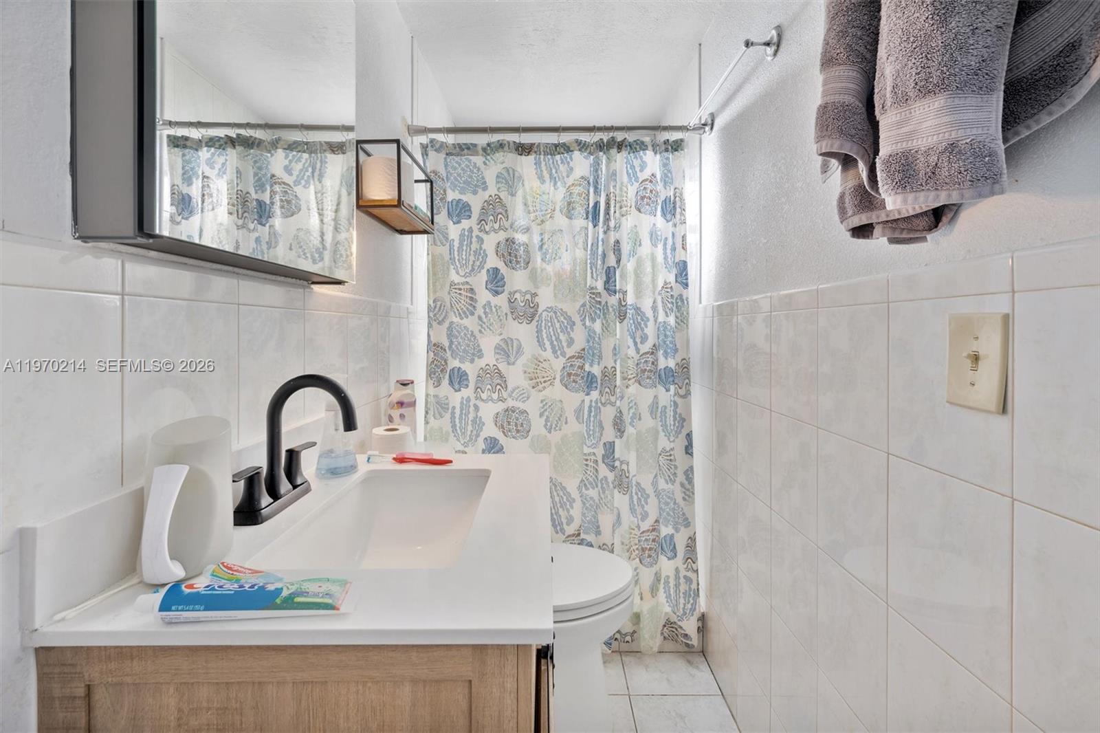 590 West 35th Place Hialeah, FL 33012 - Photo 8 of 16 a close view of a sink and tap