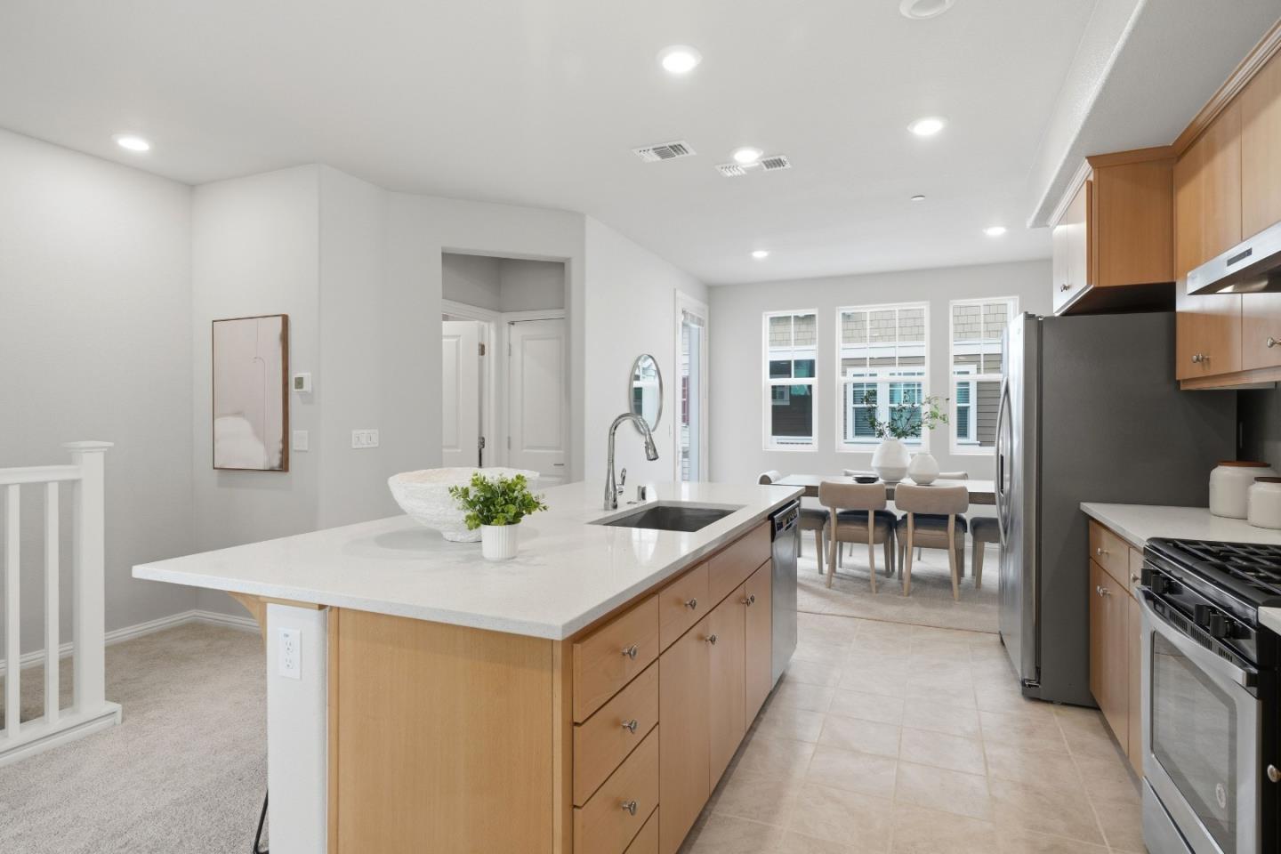 217 Orbit Way Mountain View, CA 94043 - Photo 14 of 53 a living room with stainless steel appliances kitchen island furniture and a view of living room