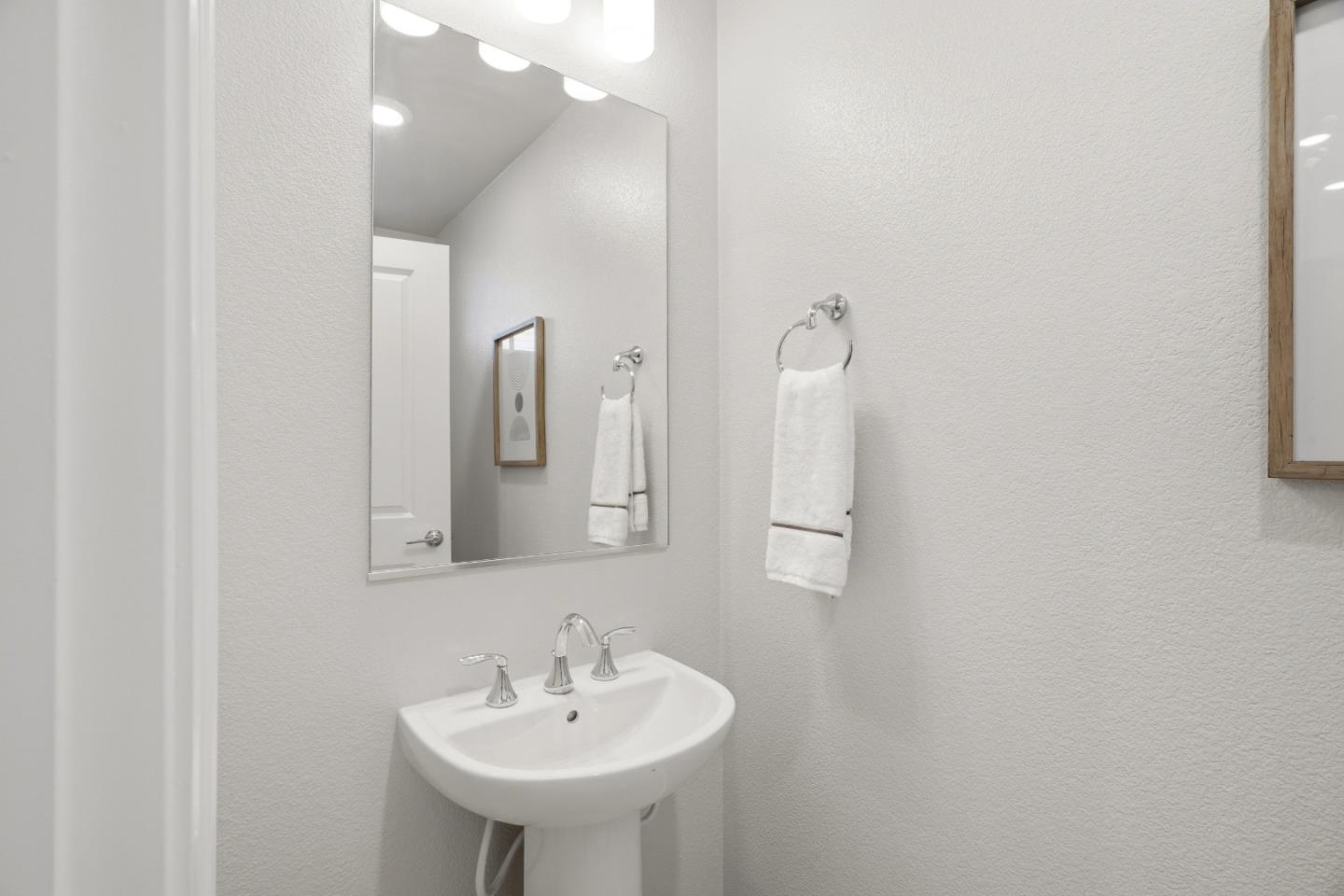 217 Orbit Way Mountain View, CA 94043 - Photo 19 of 53 a bathroom with a sink and a mirror