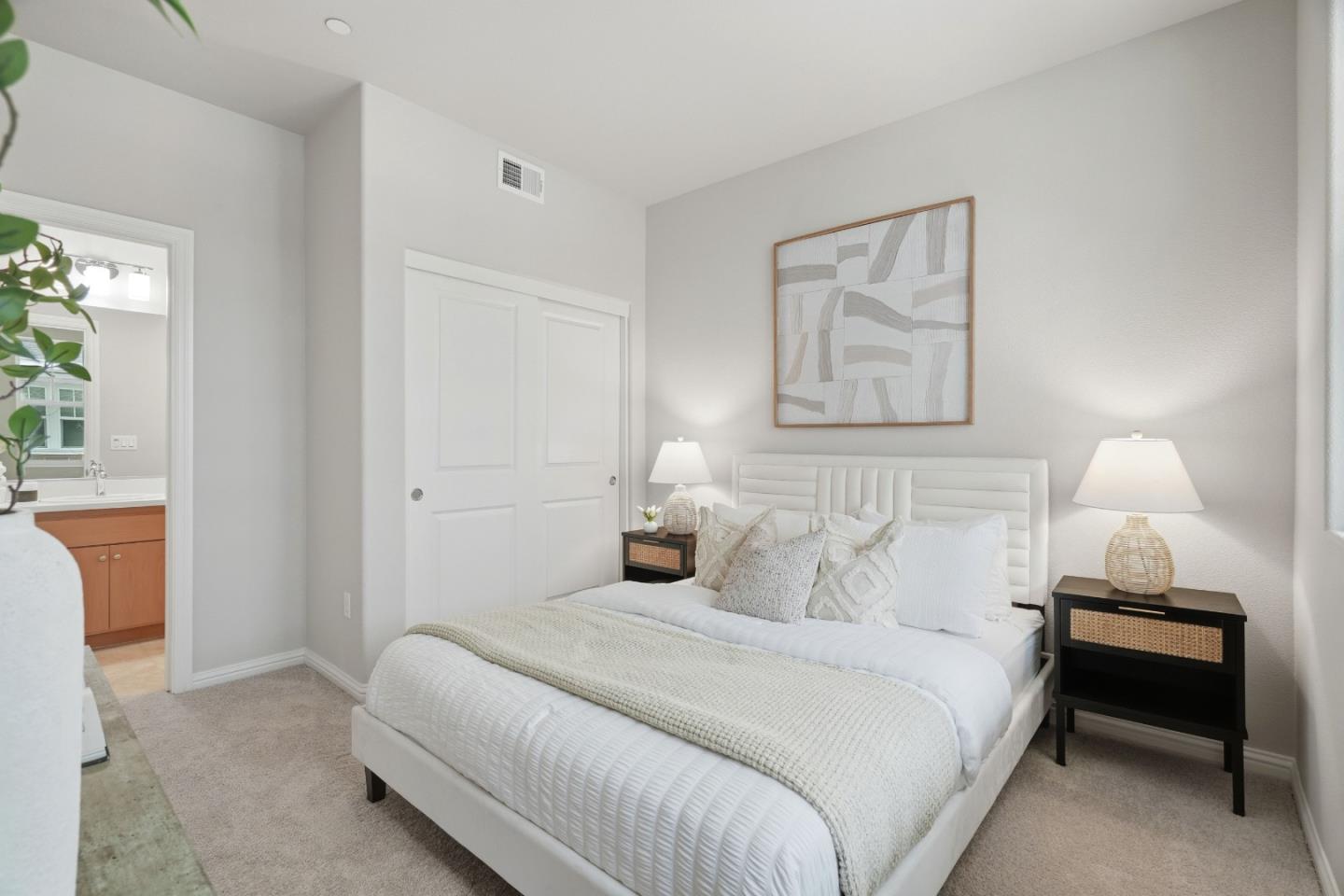 217 Orbit Way Mountain View, CA 94043 - Photo 22 of 53 a bedroom with a bed and a lamp