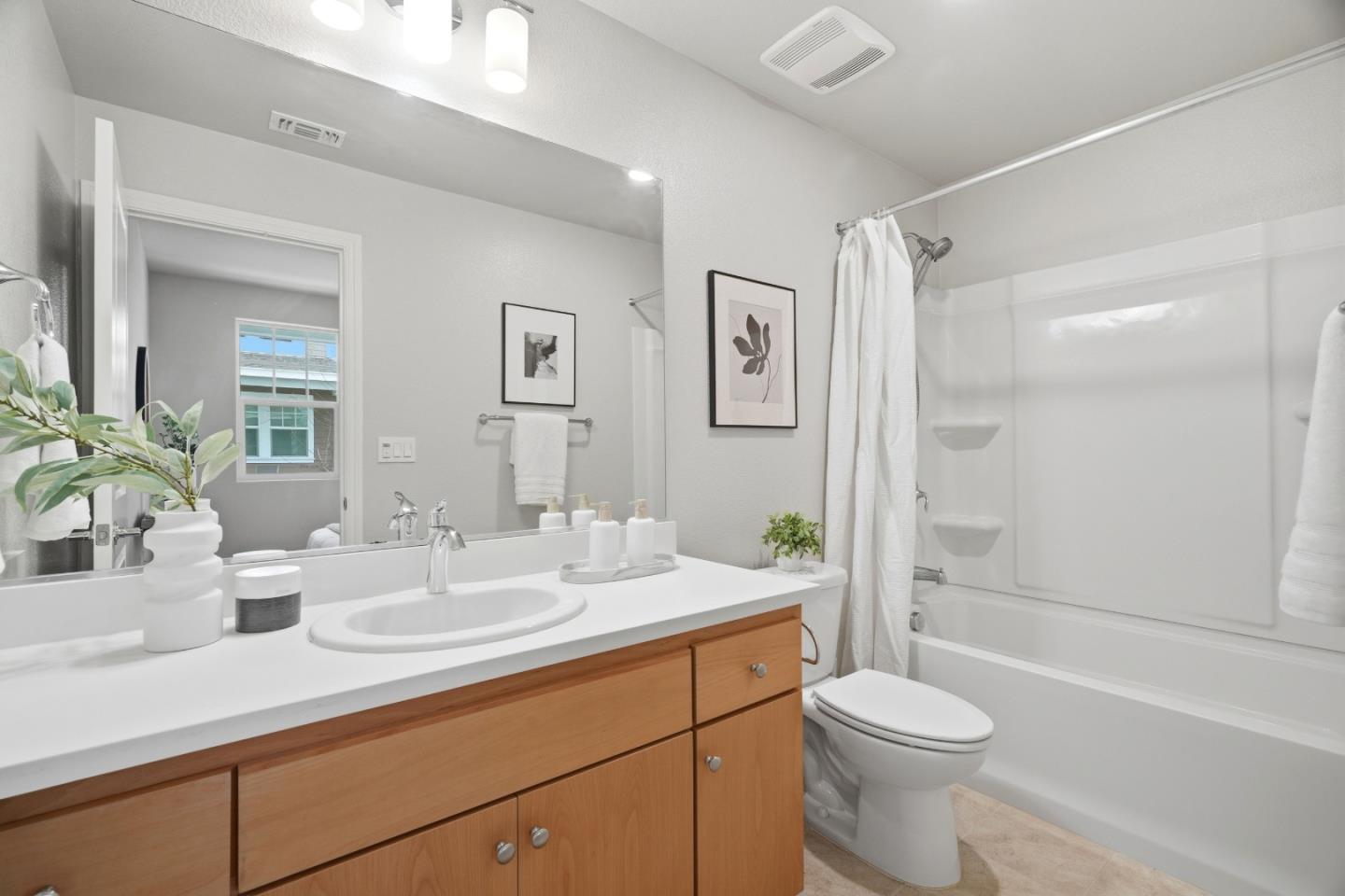 217 Orbit Way Mountain View, CA 94043 - Photo 23 of 53 a bathroom with a sink a toilet and shower