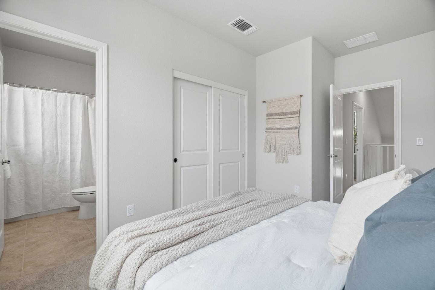 217 Orbit Way Mountain View, CA 94043 - Photo 26 of 53 a bedroom with a bed and a bathroom
