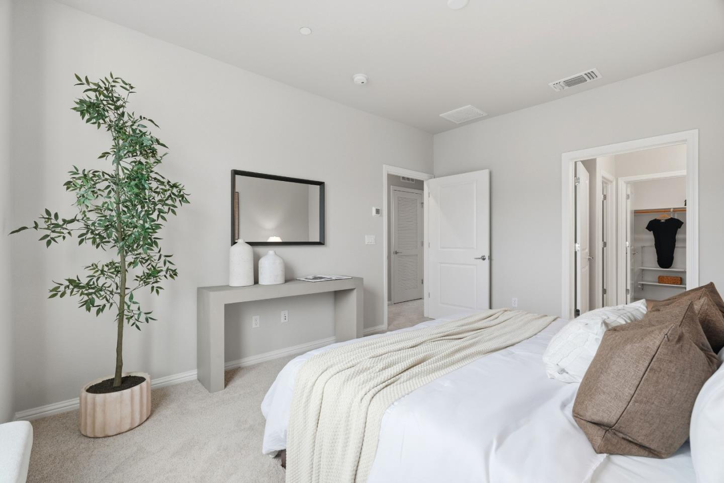 217 Orbit Way Mountain View, CA 94043 - Photo 28 of 53 a bedroom with a bed and a potted plant