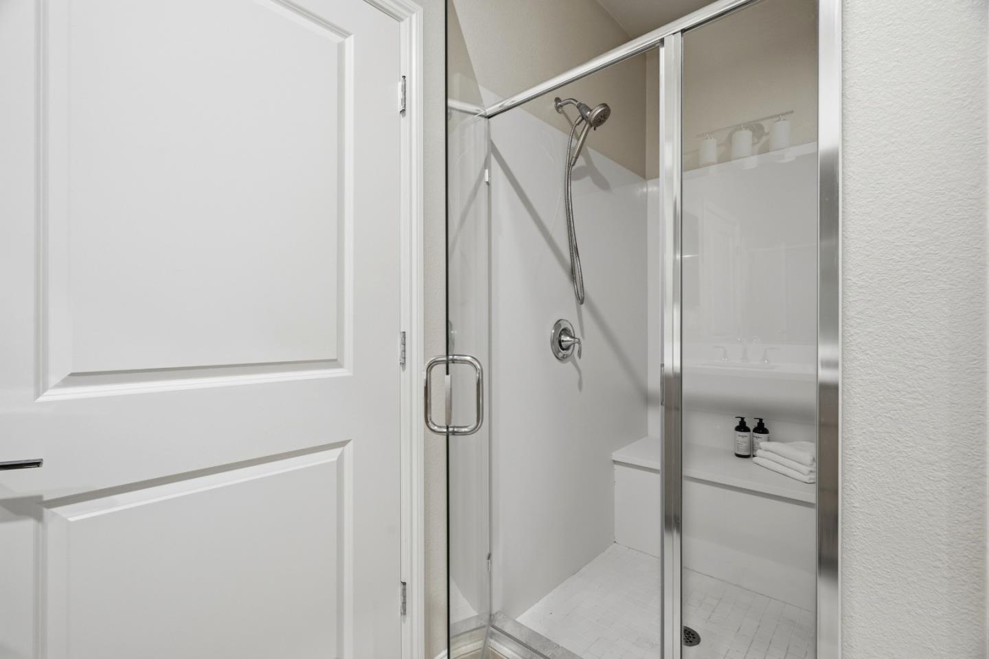 217 Orbit Way Mountain View, CA 94043 - Photo 32 of 53 a bathroom with a glass shower door