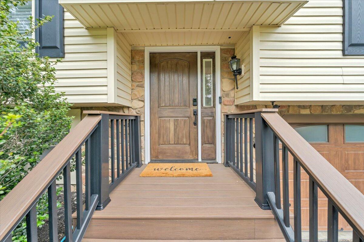 7851 Cedar Edge Road Roanoke, VA 24018 - Photo 3 of 44 a view of balcony with wooden floor and stairs