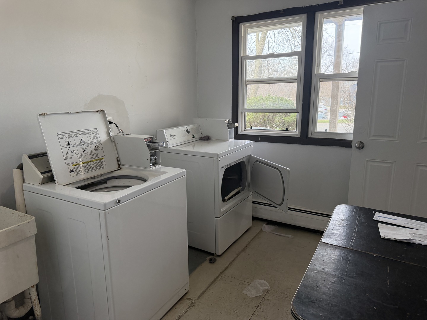 75 Willard Avenue, Unit 4 Elgin, IL 60120 - Photo 16 of 18 a utility room with dryer and washer