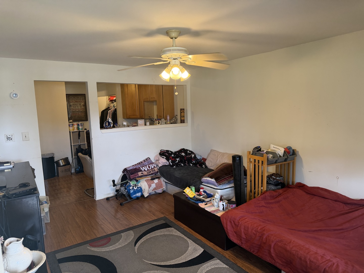 75 Willard Avenue, Unit 4 Elgin, IL 60120 - Photo 3 of 18 a bedroom with bed and a mirror