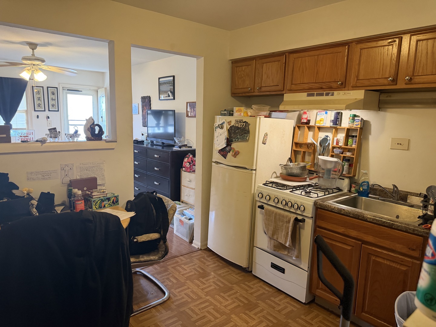 75 Willard Avenue, Unit 4 Elgin, IL 60120 - Photo 8 of 18 a kitchen with stainless steel appliances granite countertop a refrigerator a sink a stove and a refrigerator