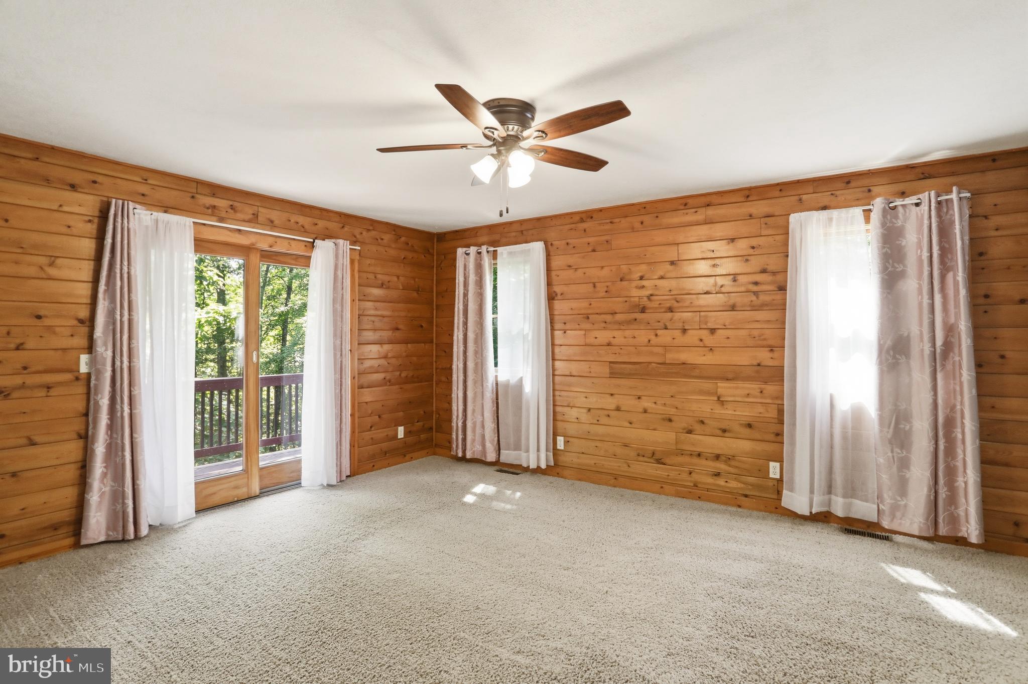 1400 Core Road Romney, WV 26757 - Photo 15 of 73 an empty room with windows and closet area