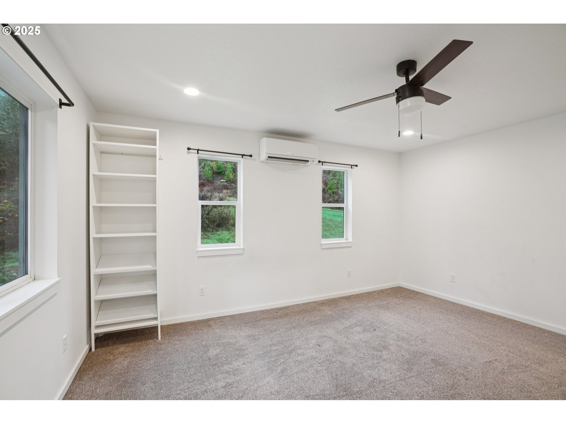 111 Finn Hall Road Woodland, WA 98674 - Photo 18 of 47 a view of an empty room with a window