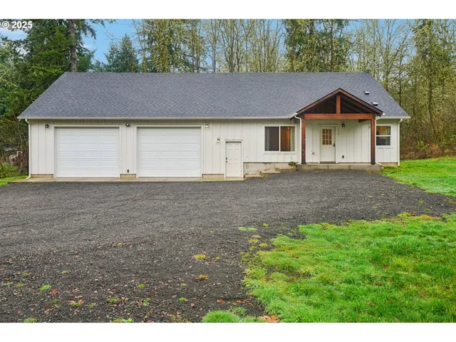 a house with trees in the background