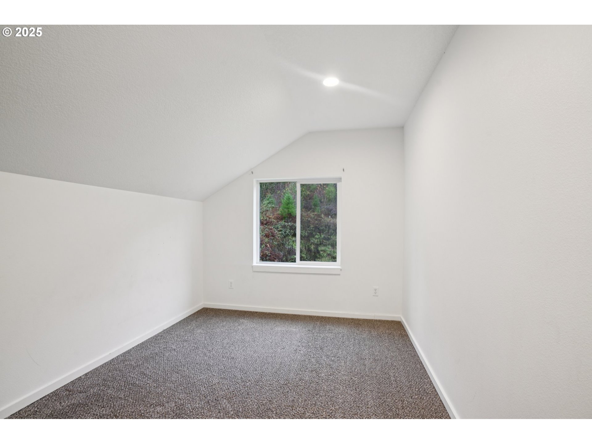 111 Finn Hall Road Woodland, WA 98674 - Photo 23 of 47 a view of an empty room with a window