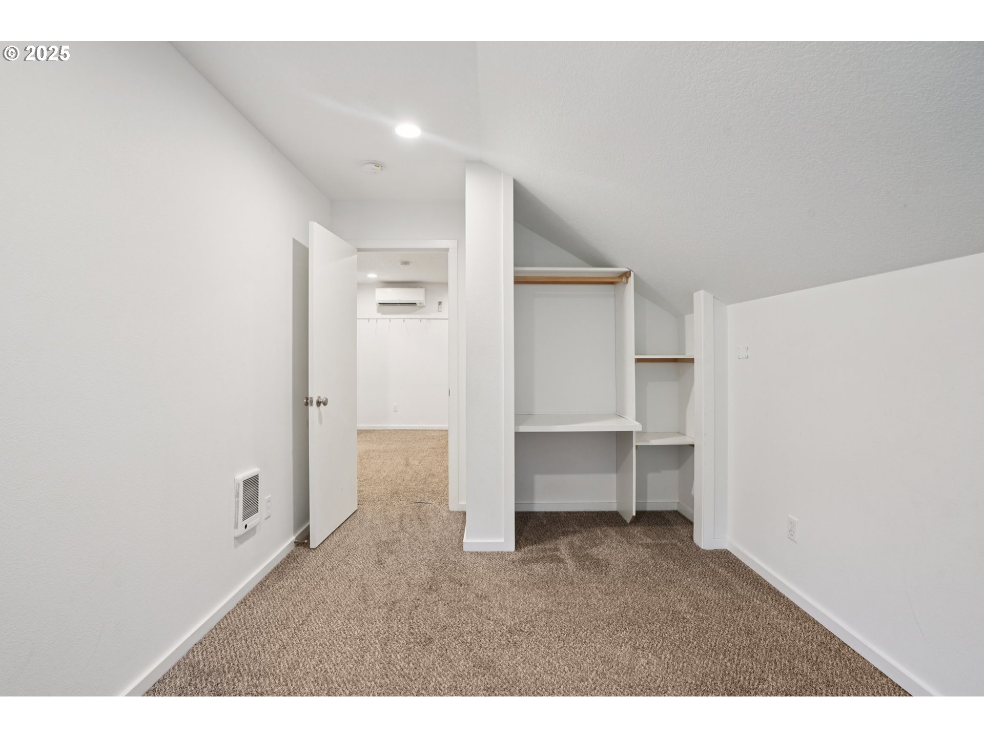 111 Finn Hall Road Woodland, WA 98674 - Photo 24 of 47 a view of room with open cabinet and mirrors