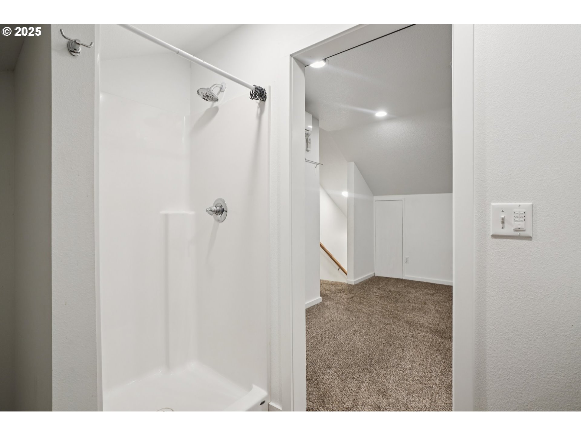 111 Finn Hall Road Woodland, WA 98674 - Photo 26 of 47 a bathroom with a shower and a glass door