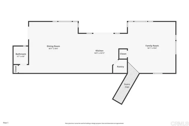 an entryway with wooden floor and windows