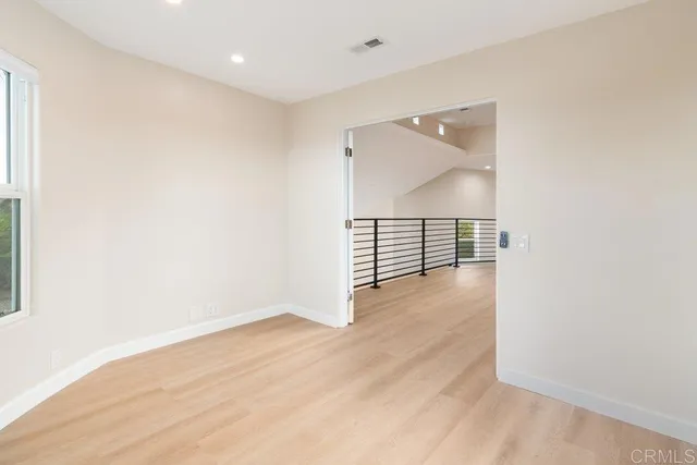 a kitchen with stainless steel appliances a refrigerator stove and microwave