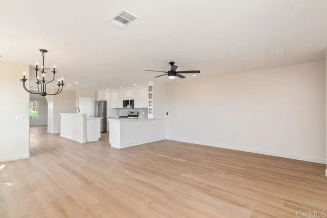 a view of a house with a yard and garage
