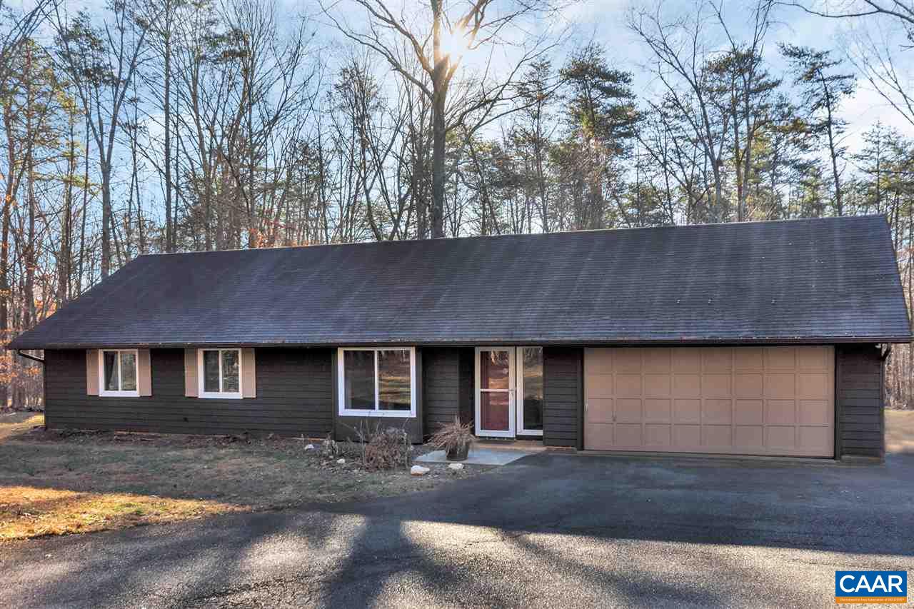 1065 Hunters Ridge Road Earlysville, VA 22936 - Photo 1 of 27 a front view of a house with yard
