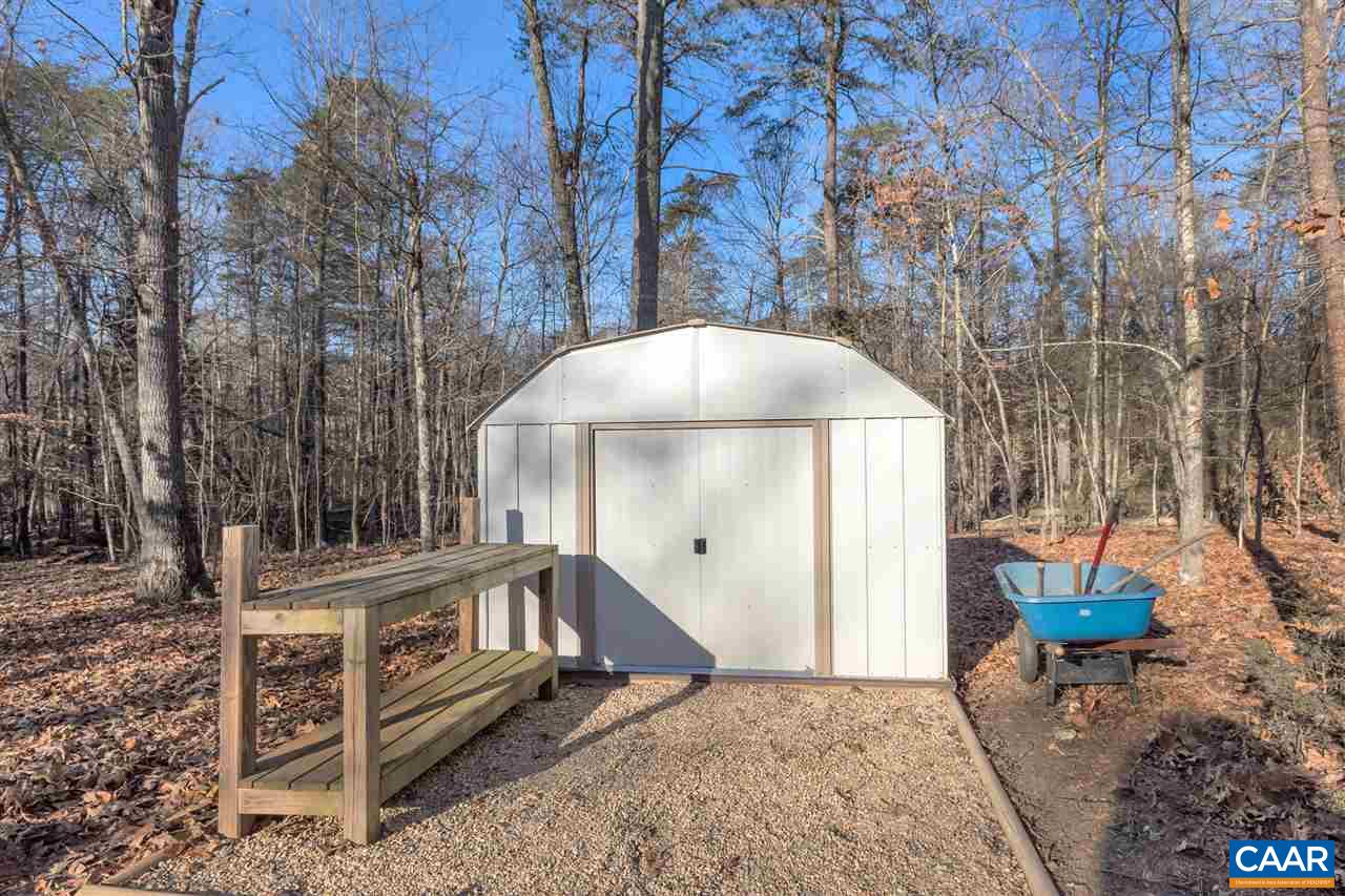 1065 Hunters Ridge Road Earlysville, VA 22936 - Photo 27 of 27 a front view of a house with yard and sitting area