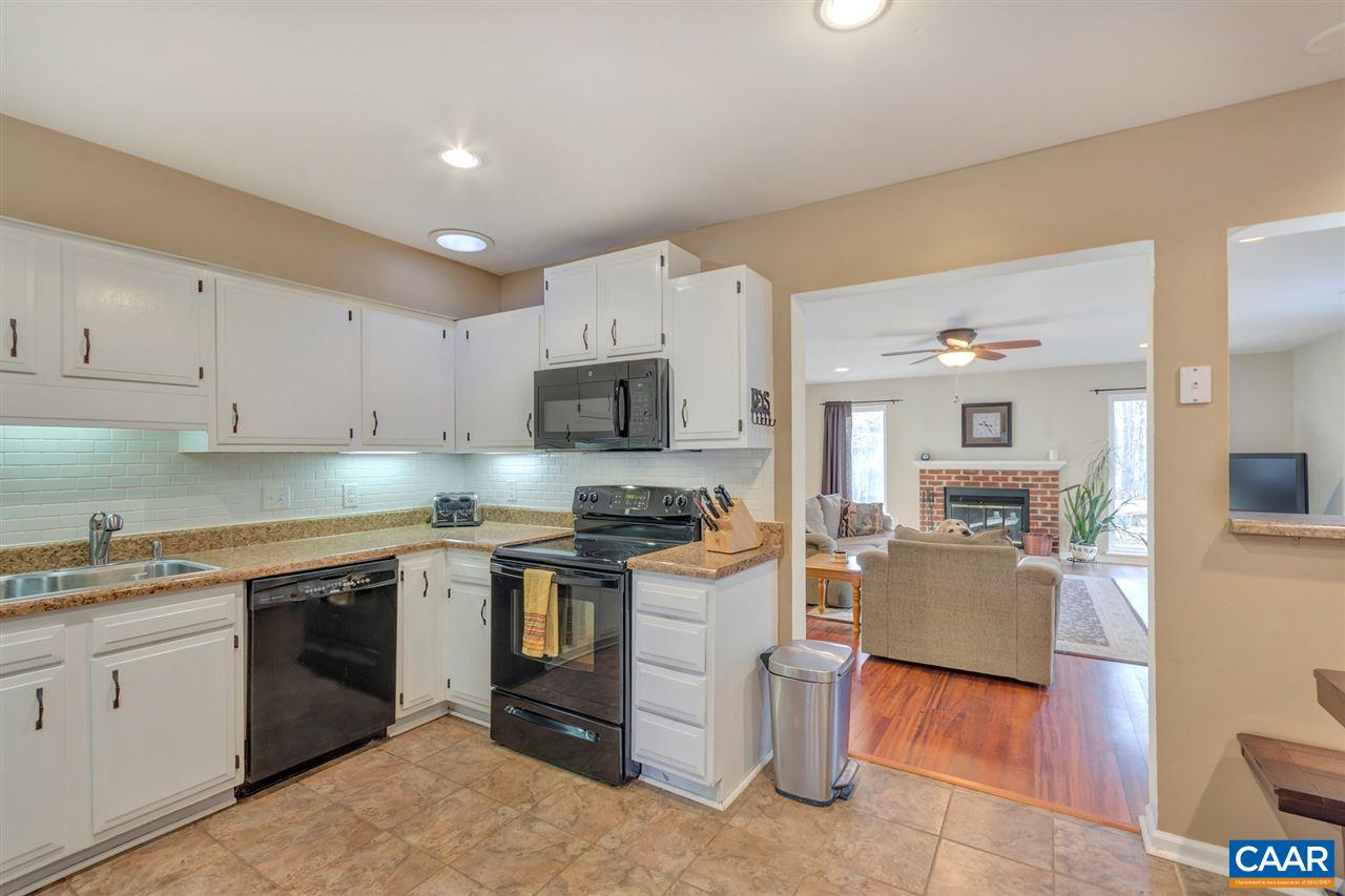 1065 Hunters Ridge Road Earlysville, VA 22936 - Photo 6 of 27 a kitchen with cabinets a sink and appliances