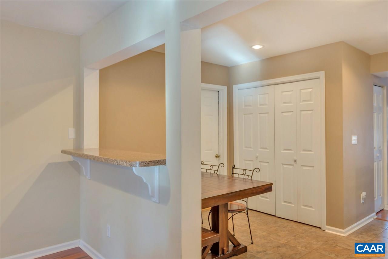 1065 Hunters Ridge Road Earlysville, VA 22936 - Photo 10 of 27 a view of an entryway with table and workspace