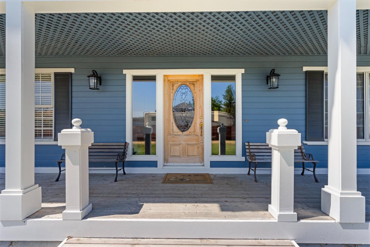 695 Hospital Road Hollister, CA 95023 - Photo 4 of 61 a front view of a house with outdoor shower