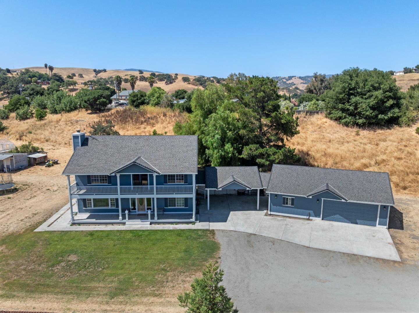 695 Hospital Road Hollister, CA 95023 - Photo 54 of 61 an aerial view of a house having swimming pool garden and patio