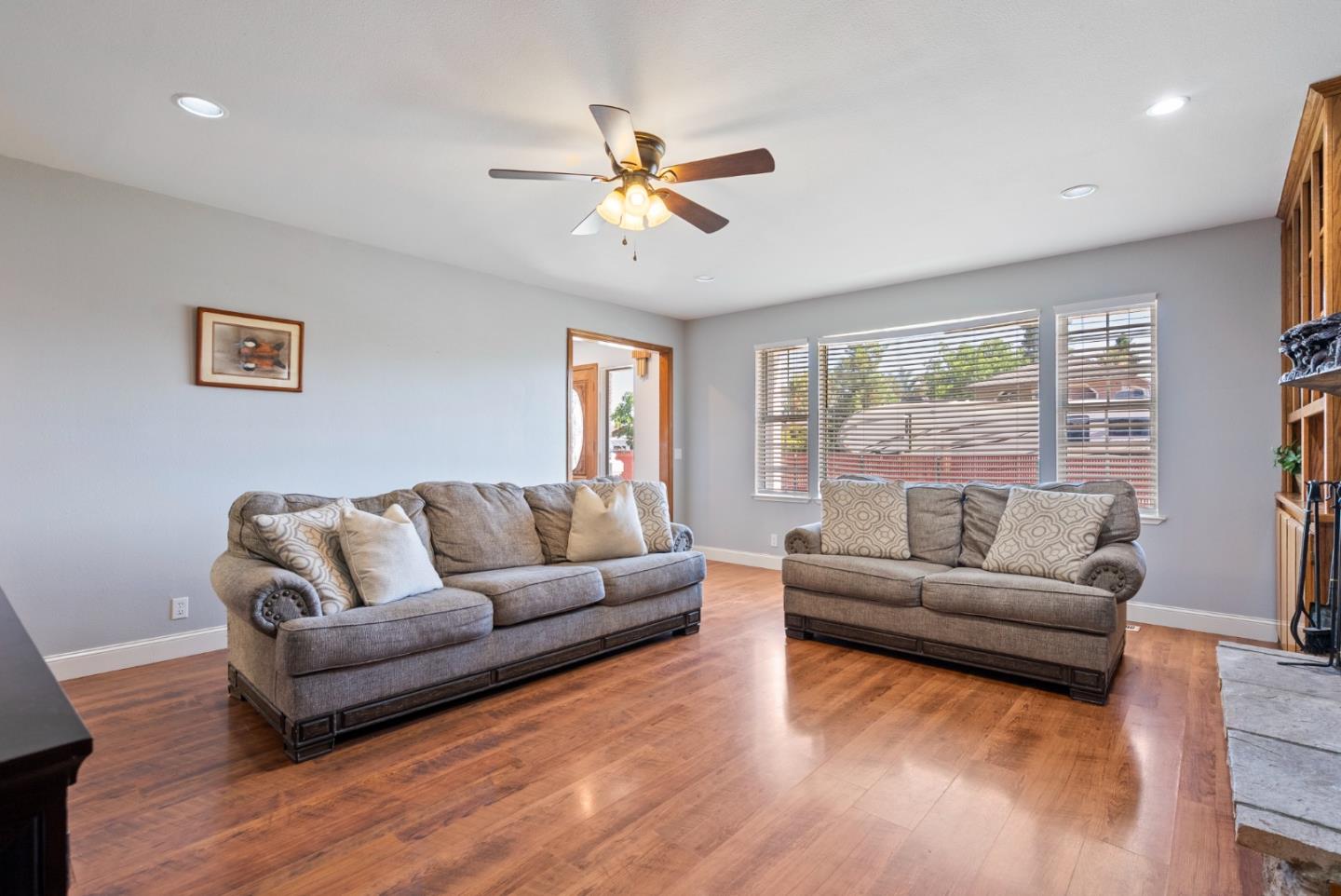 695 Hospital Road Hollister, CA 95023 - Photo 9 of 61 a living room with furniture and a large window