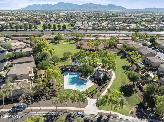 an aerial view of residential house with outdoor space