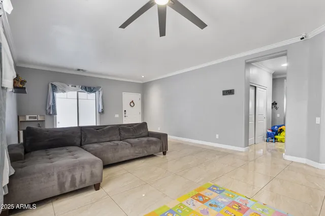 a living room with furniture and a couch