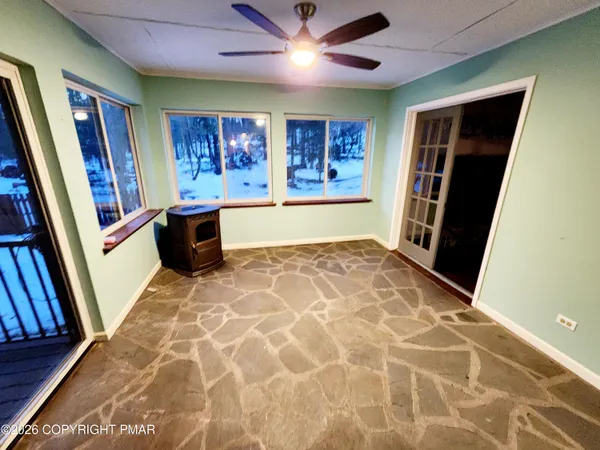 a view of an entryway with a workspace