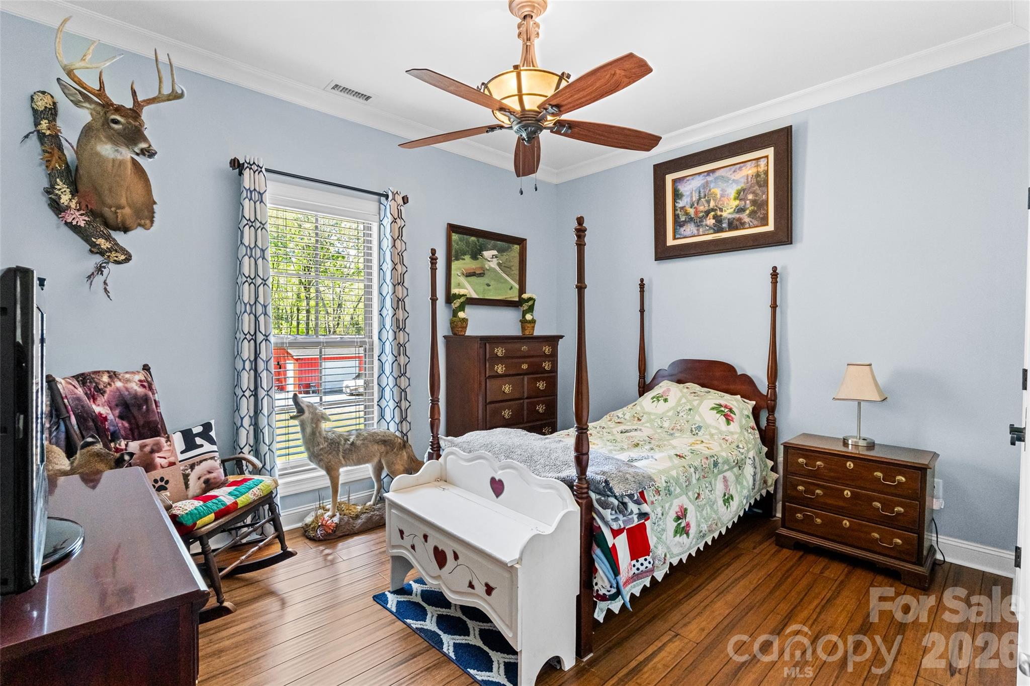 643 John Doster Road Pageland, SC 29728 - Photo 25 of 35 a bedroom with a bed and wooden floor