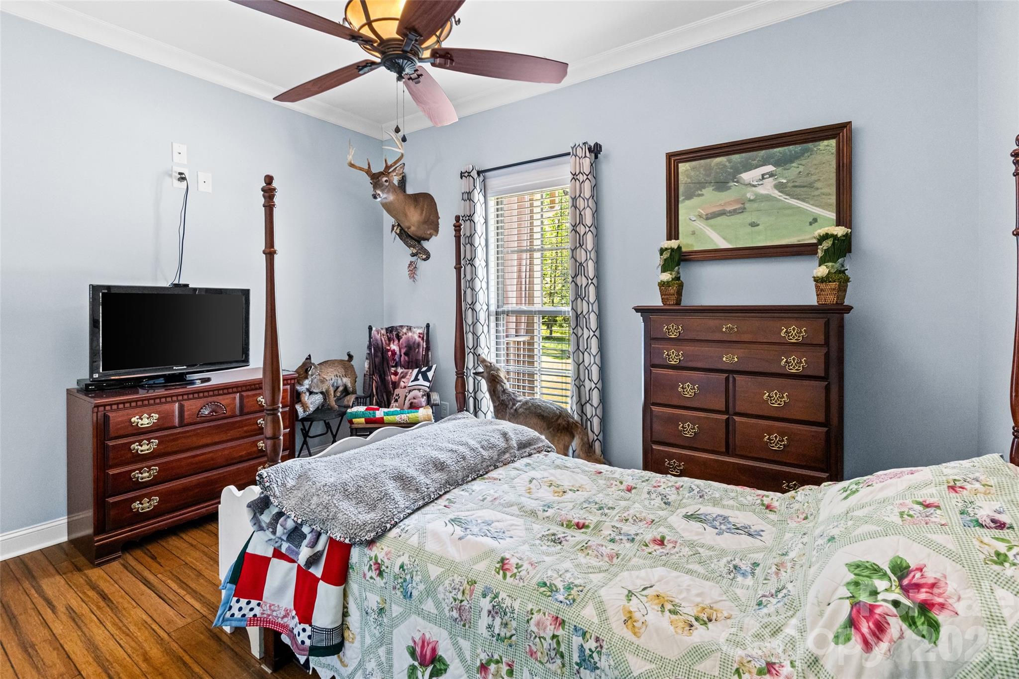 643 John Doster Road Pageland, SC 29728 - Photo 26 of 35 a bedroom with a bed and a flat screen tv