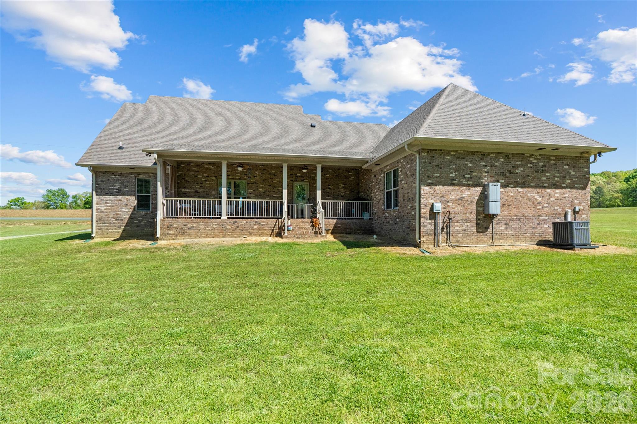 643 John Doster Road Pageland, SC 29728 - Photo 34 of 35 a view of a house with a backyard and a garden