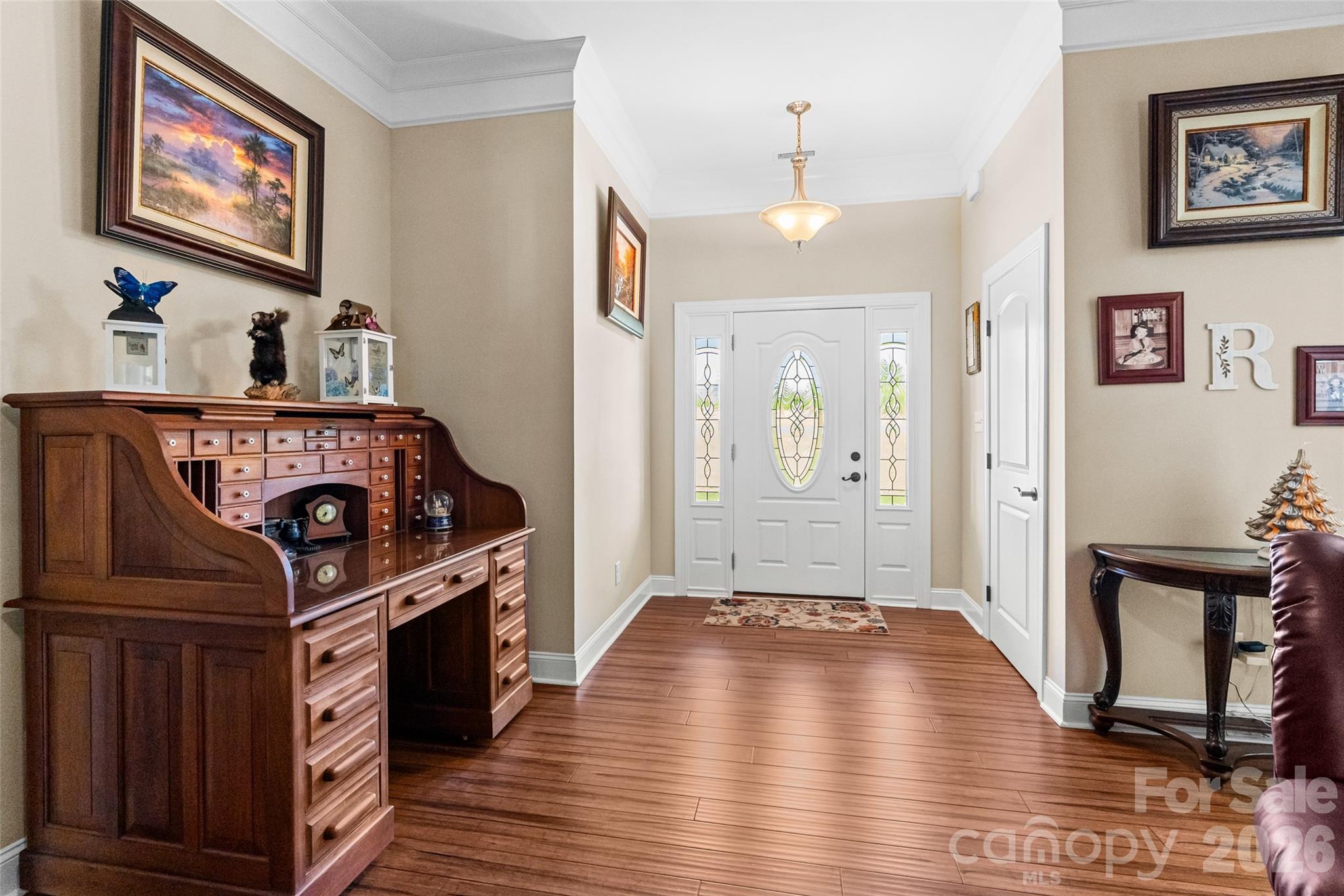 643 John Doster Road Pageland, SC 29728 - Photo 5 of 35 a kitchen with a stove and wooden floor