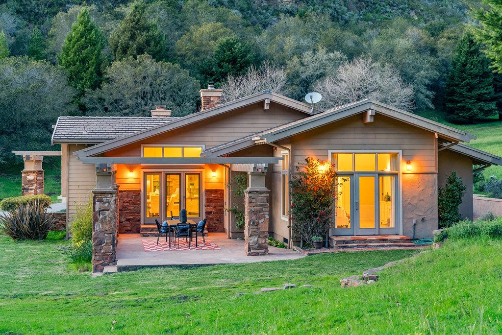 4575 Paul Sweet Road Soquel, CA 95073 - Photo 2 of 55 a patio with a table and chairs under an umbrella