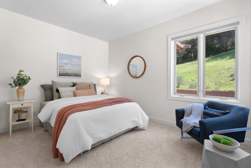 4575 Paul Sweet Road Soquel, CA 95073 - Photo 29 of 55 a bedroom with bed and a window