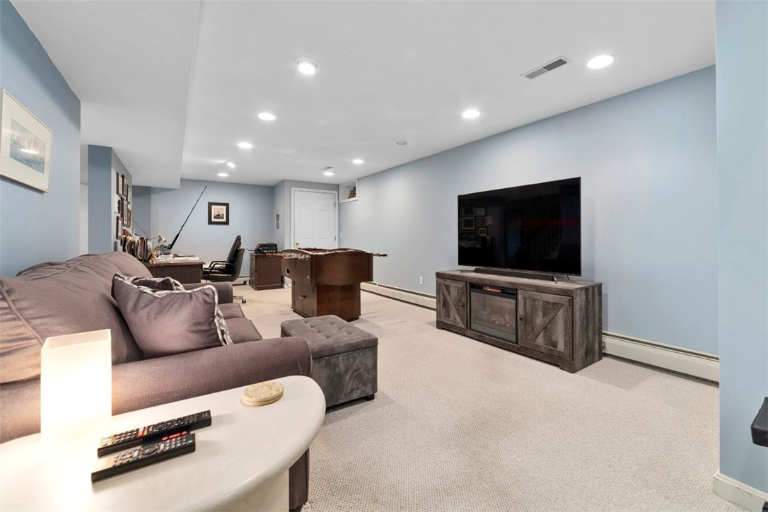 140 Wickford Point Road North Kingstown, RI 02852 - Photo 35 of 40 Finished area of basement with great storage closets