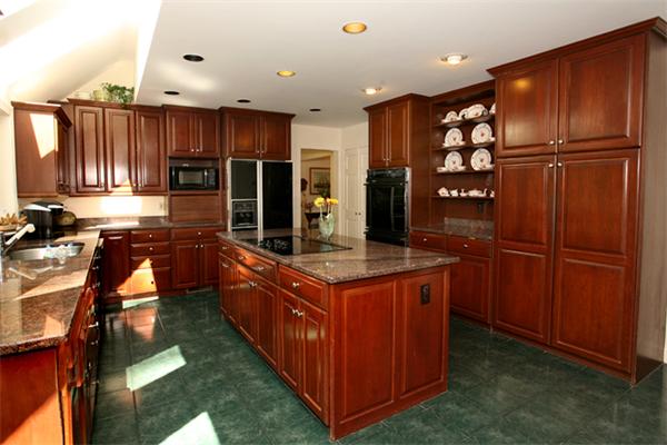 32 Chandler Road Boxford, MA 01921 - Photo 3 of 28 a kitchen with stainless steel appliances granite countertop a stove and a refrigerator
