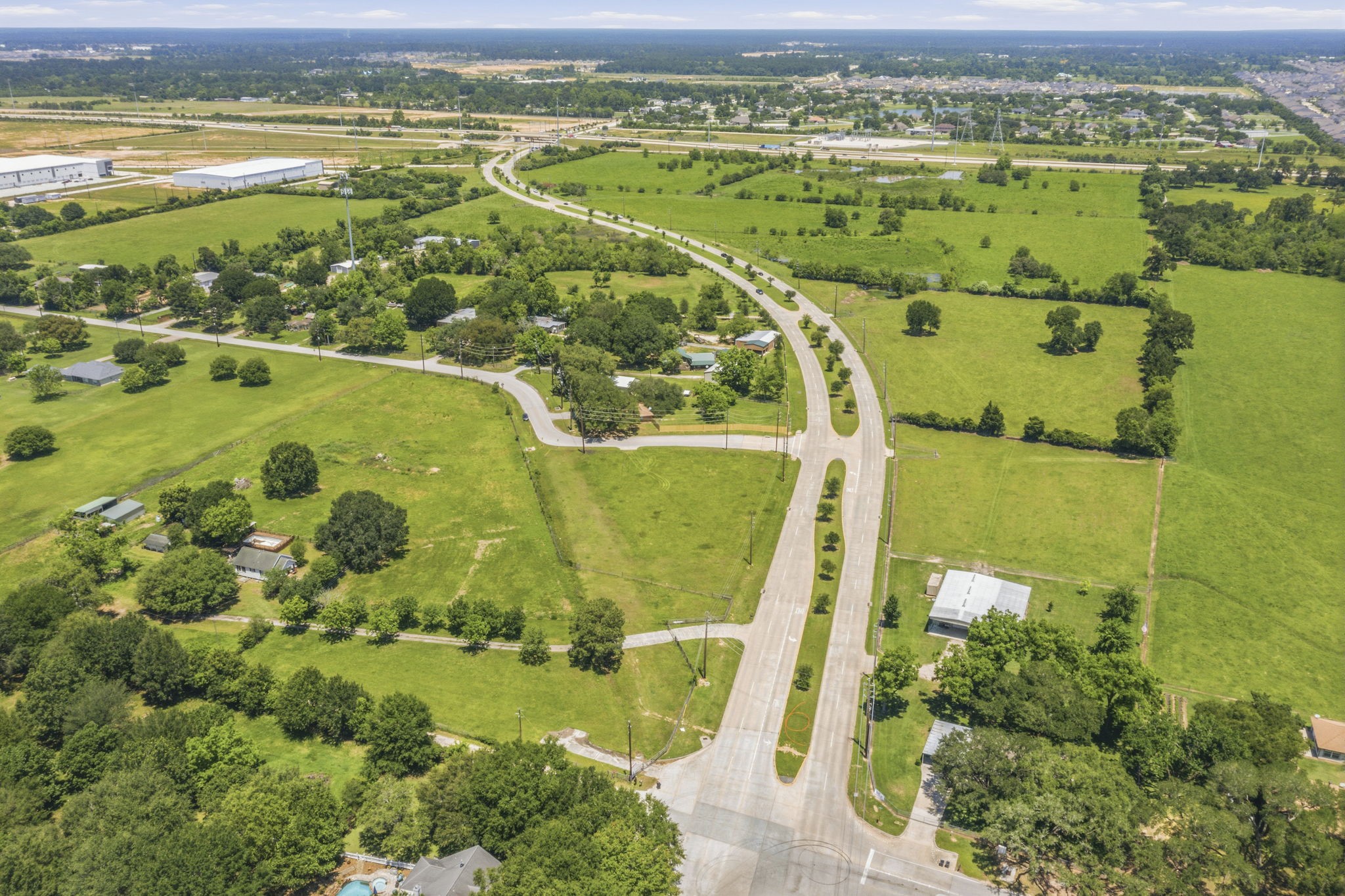 0 Mueschke Road Tomball, TX 77377 - Photo 25 of 44 an aerial view of a residential houses with outdoor space and city view